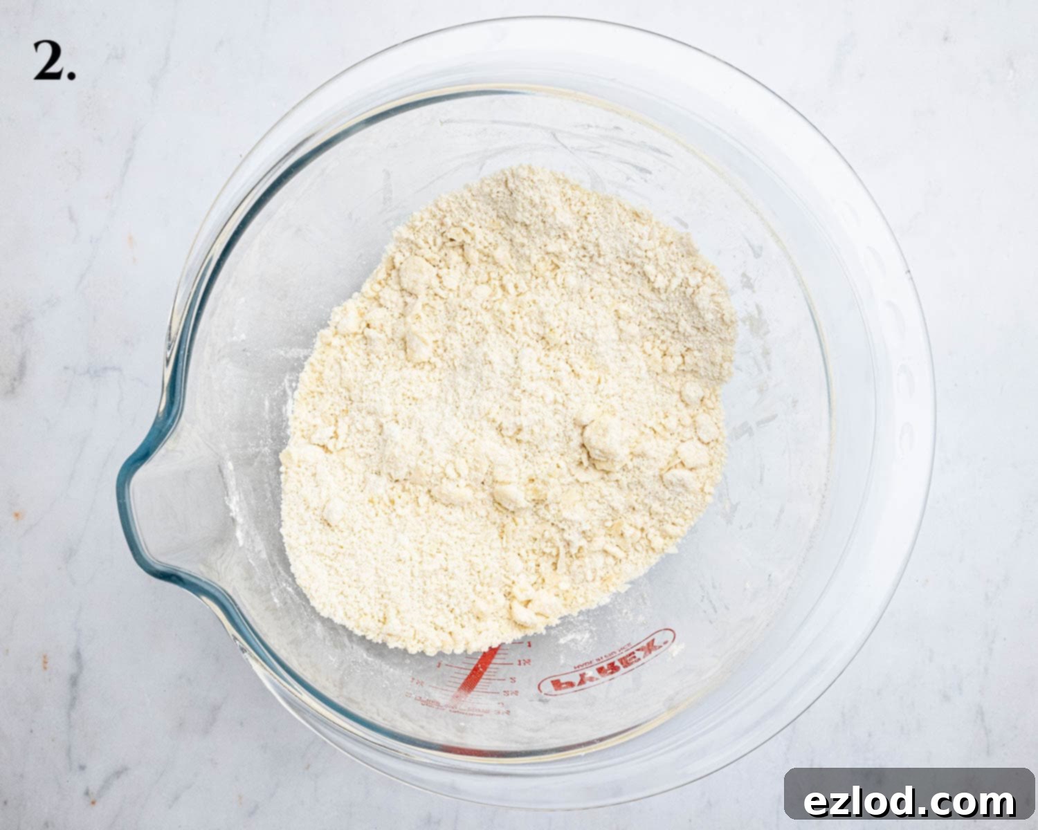 Step 2, the butter rubbed into the dry ingredients.