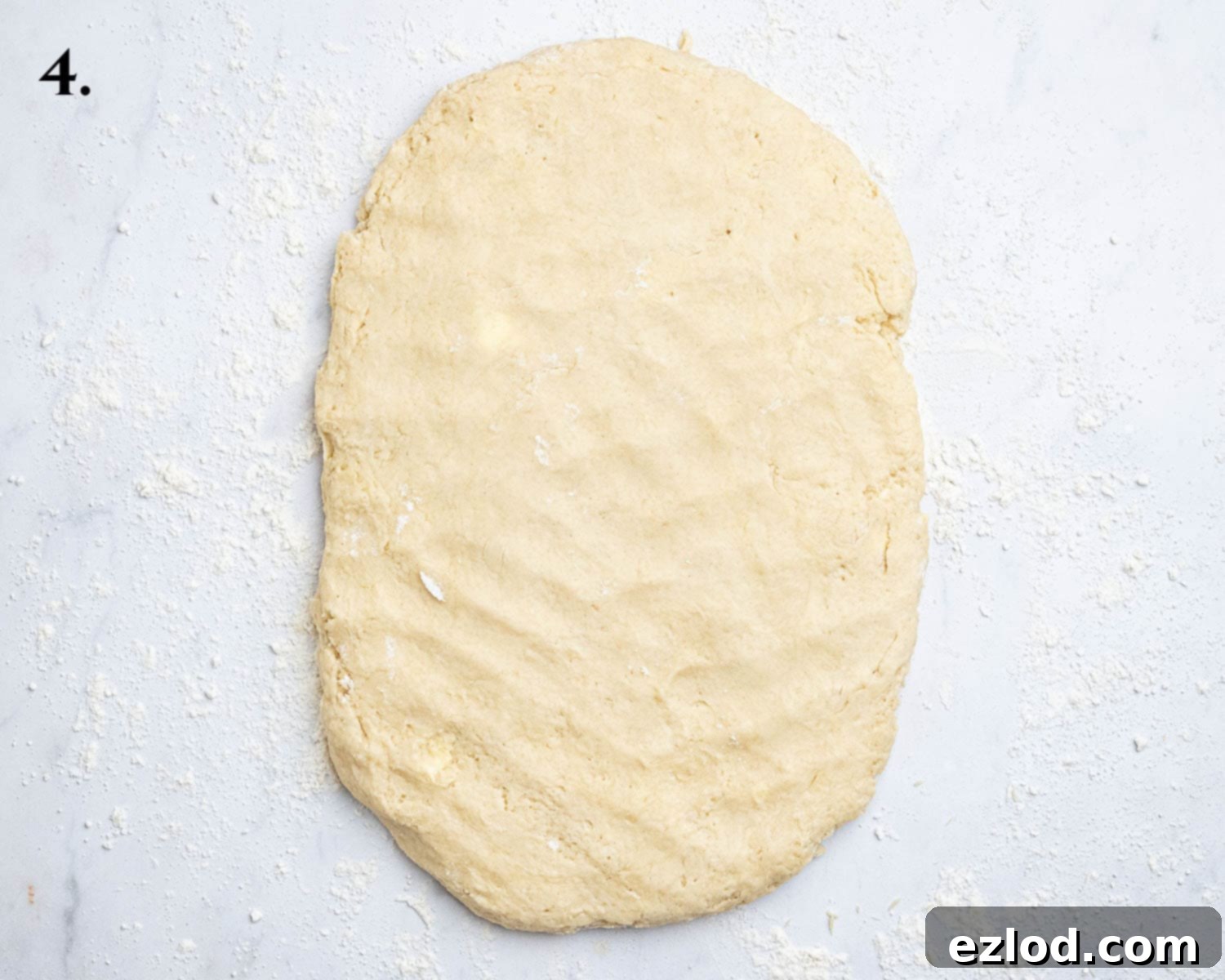 Step 4, the dough patted out on a floured surface.
