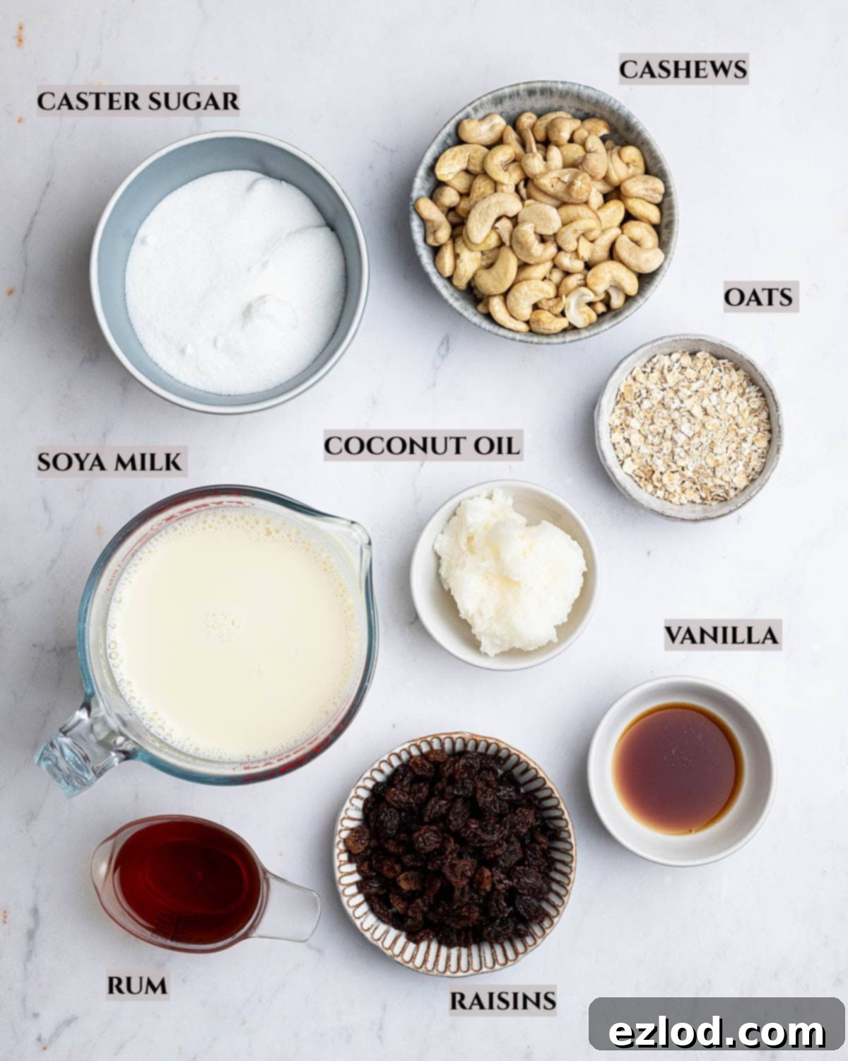 A labelled photo of thje ingredients needed to make vegan rum and raisin ice cream.
