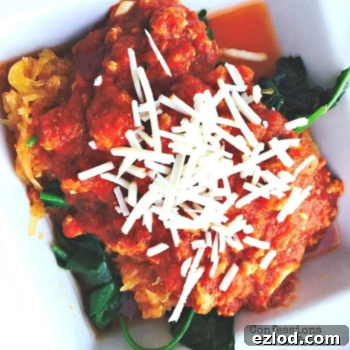 A bowl of spaghetti squash with meat sauce.