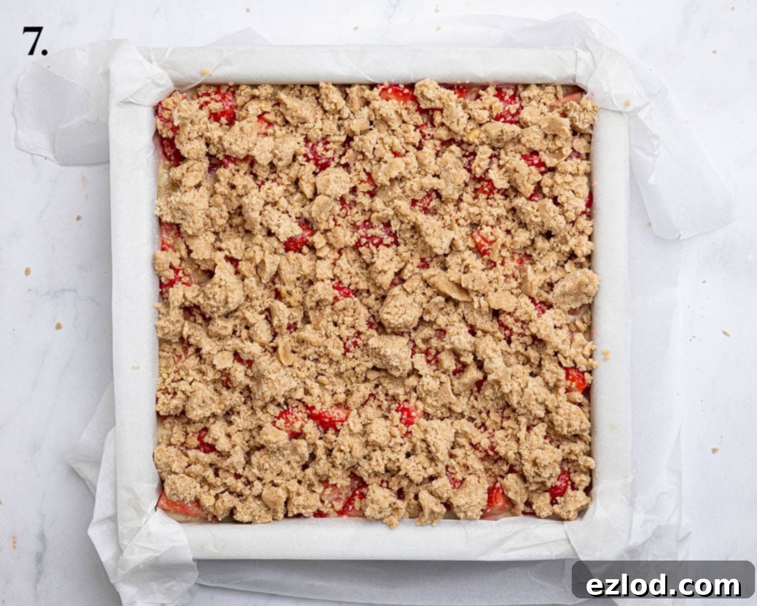 Vegan Strawberry Crumb Cake 11 Step 7: The cake with both the strawberry and streusel toppings added, ready for baking.