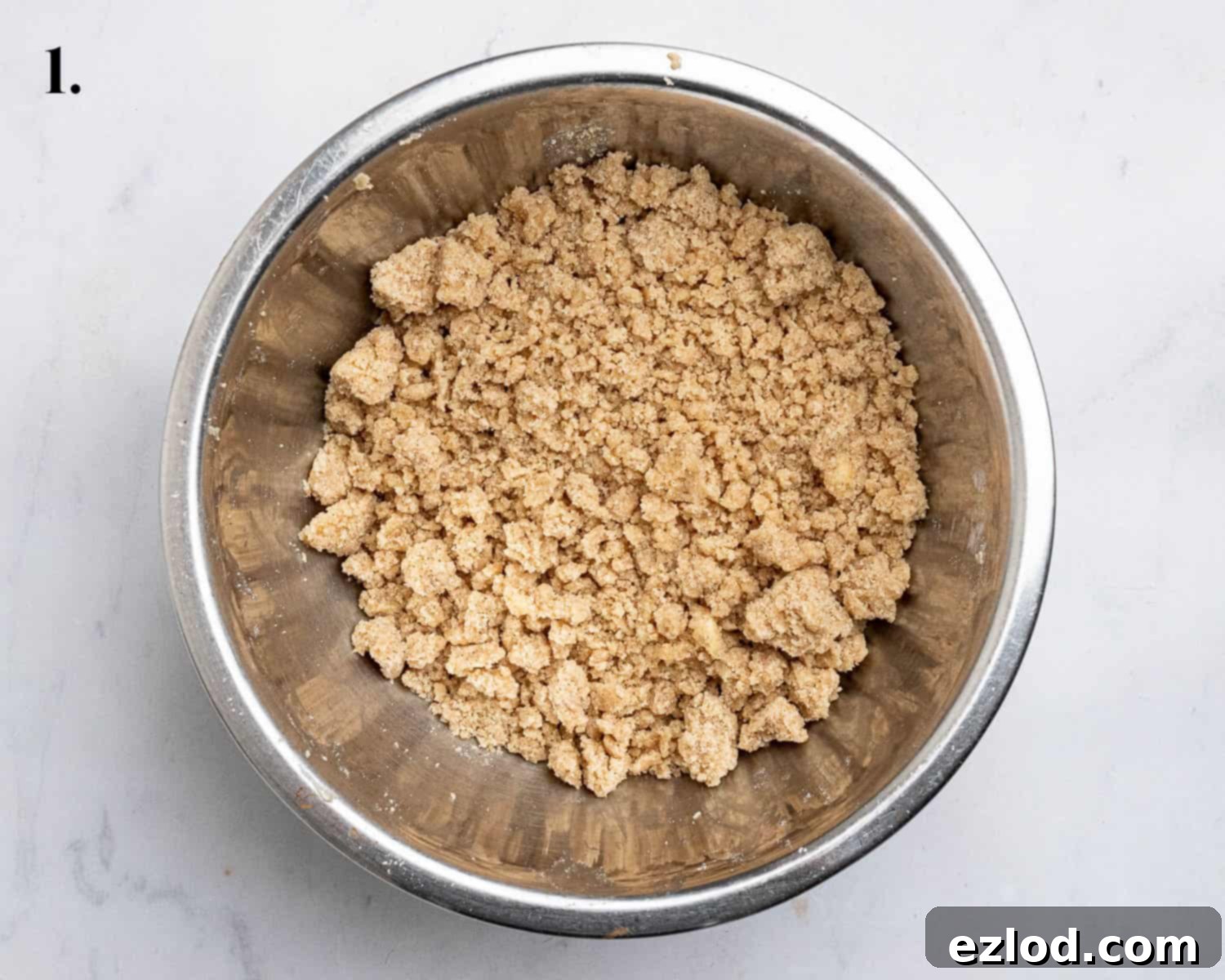 Vegan Strawberry Crumb Cake 5 Step 1: The crumb topping mixture in a mixing bowl.