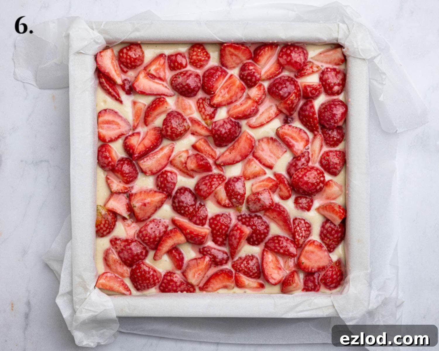 Vegan Strawberry Crumb Cake 10 Step 6: The cake batter with the strawberry topping scattered over it.