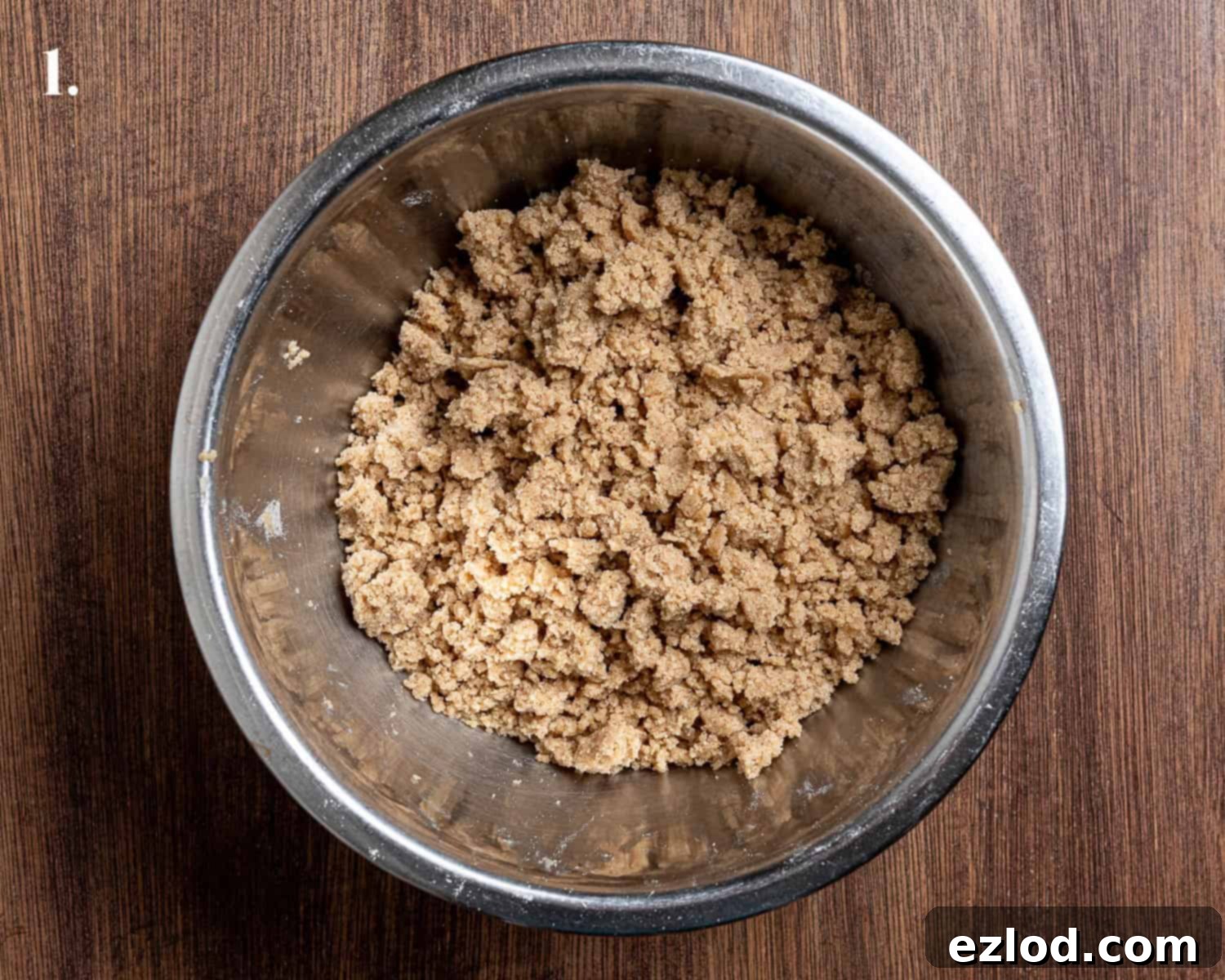 Step 1: The streusel topping ingredients mixed in a bowl, ready for assembly.