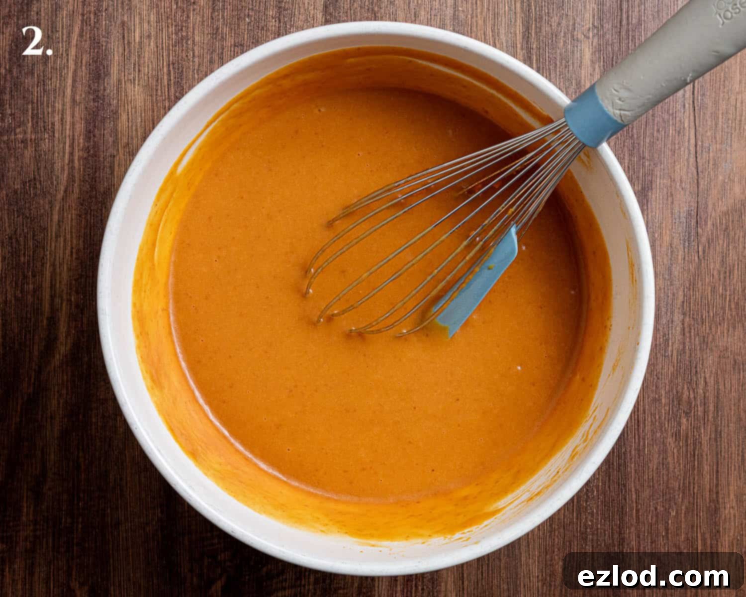 Step 2: The wet ingredients for the muffin batter, beautifully whisked together in a bowl.