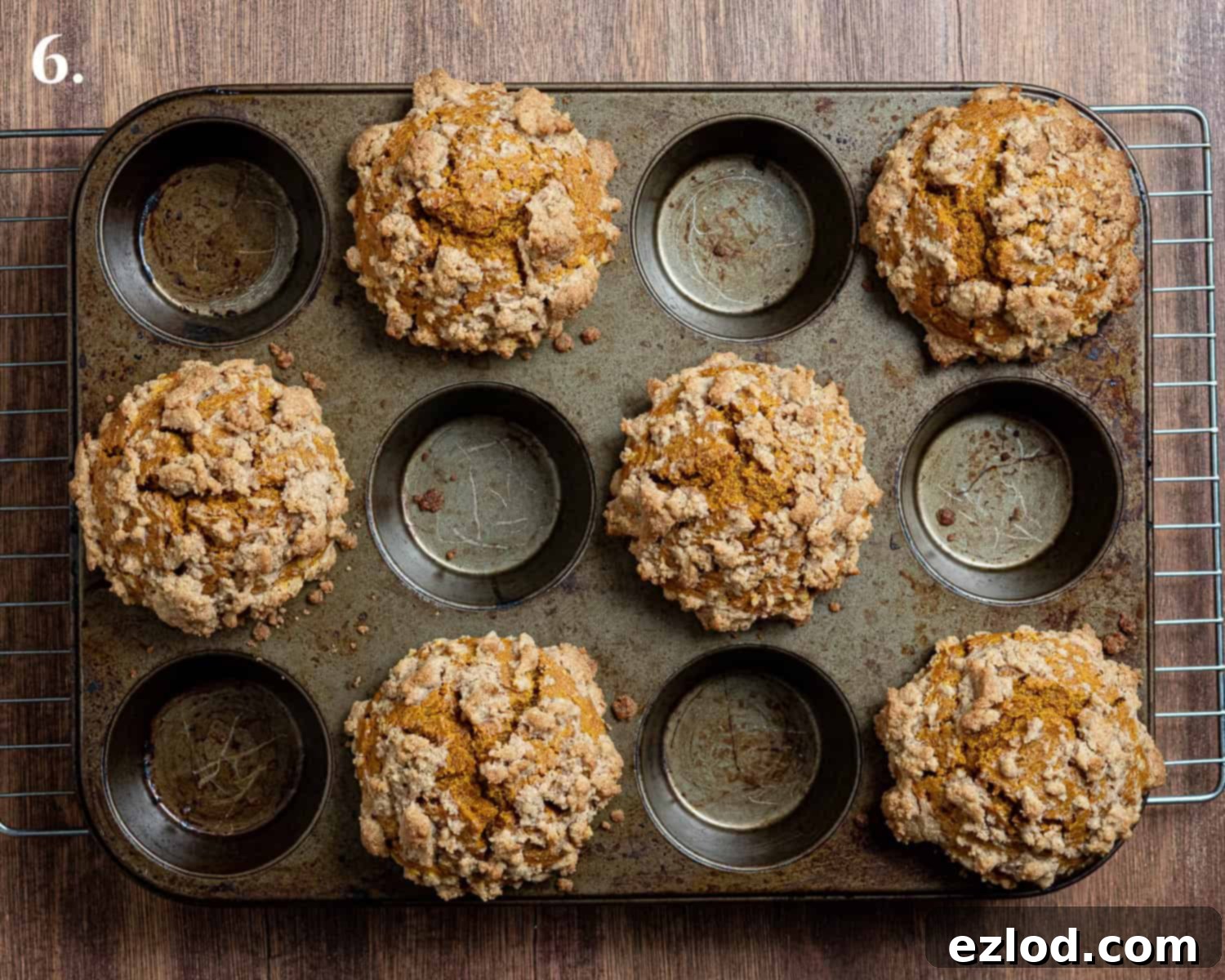 Step 6: Freshly baked vegan pumpkin streusel muffins, golden brown and perfectly risen.