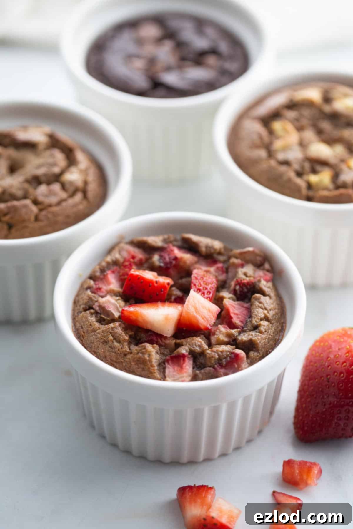 Blender baked oats 4 ways: strawberry, apple, peanut butter banana, and chocolate.