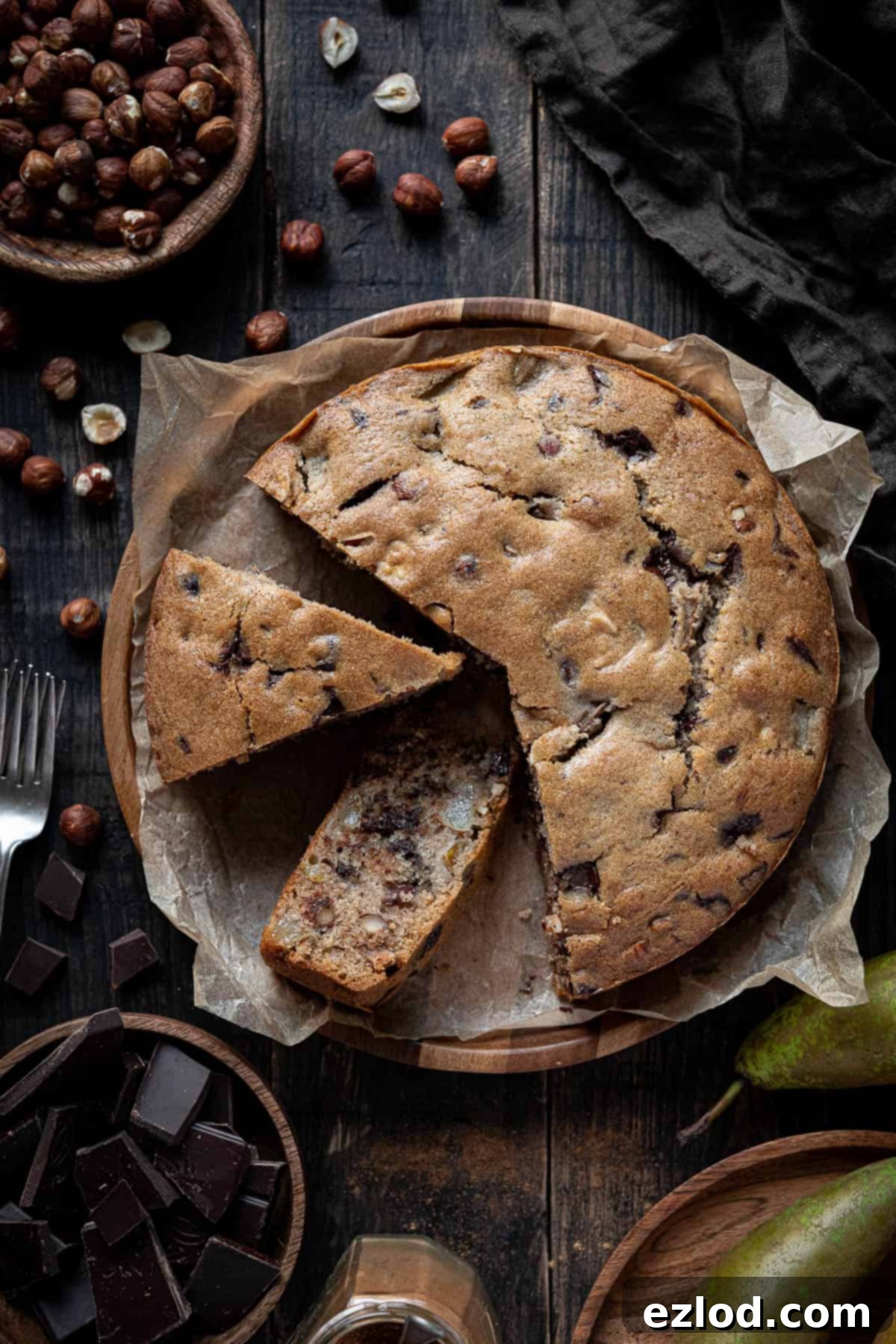 A vibrant collage of various images related to the vegan chocolate, pear, and hazelnut cake, suitable for Pinterest sharing.