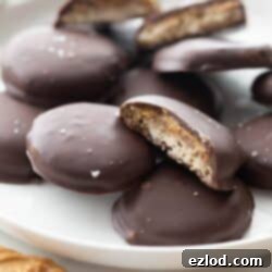 Close up of homemade Tagalongs with a crispy cookie and creamy peanut butter layer.