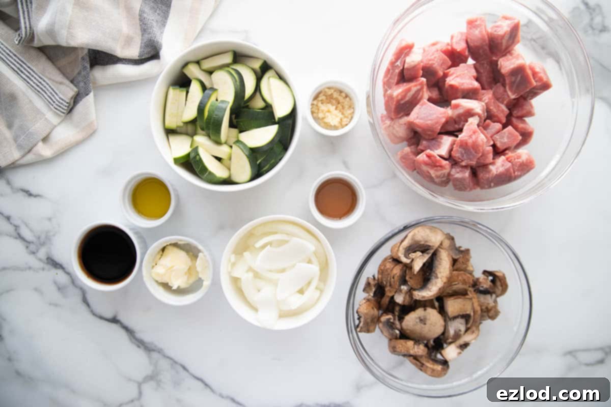 Sizzling Hibachi Steak 4 Raw hibachi steak ingredients in individual bowls.