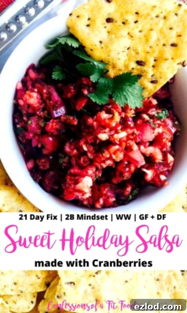Close up photo of a white bowl of cranberry salsa with gluten free tortilla chips on the side. Black and pink text overlay on a white background - text says, 21 Day Fix | 2B Mindset | WW | GF + DF | Sweet Holiday Salsa made with Cranberries | Confessions of a Fit Foodie