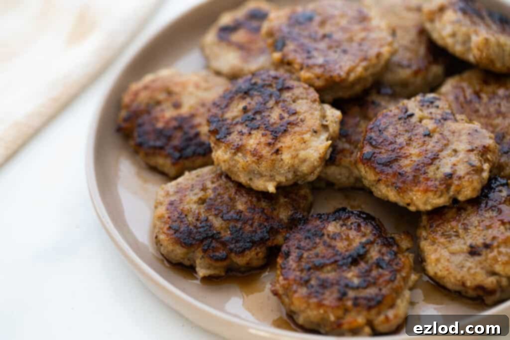 Plate of cooked chicken breakfast sausage patties.