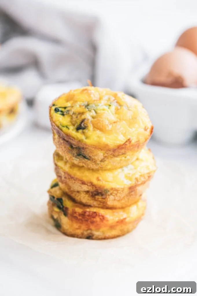 21 Day Fix Meal Plan Volume 19: Mastering Portion Control 2 Three egg bites are stacked on a white surface.