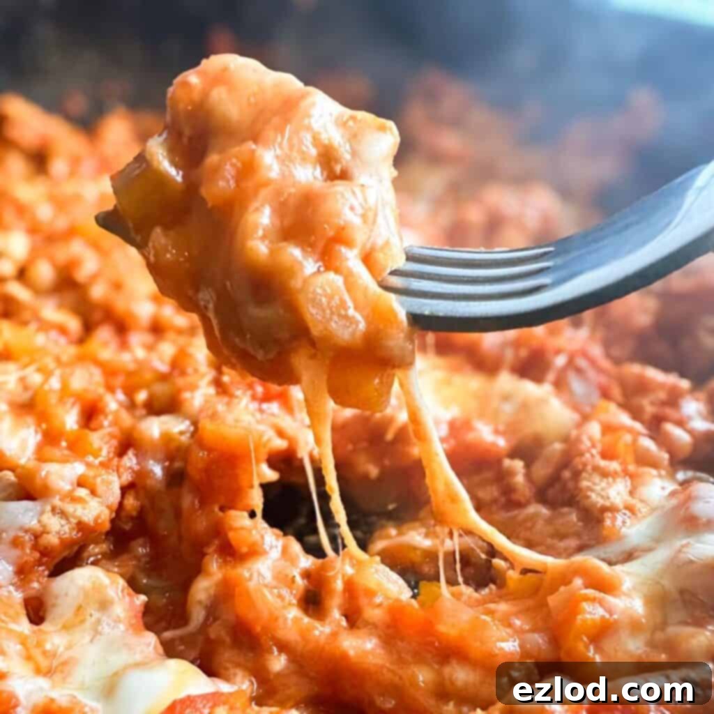 21 Day Fix Meal Plan Volume 19: Mastering Portion Control 4 Colorful stuffed peppers skillet with ground meat and vegetables.