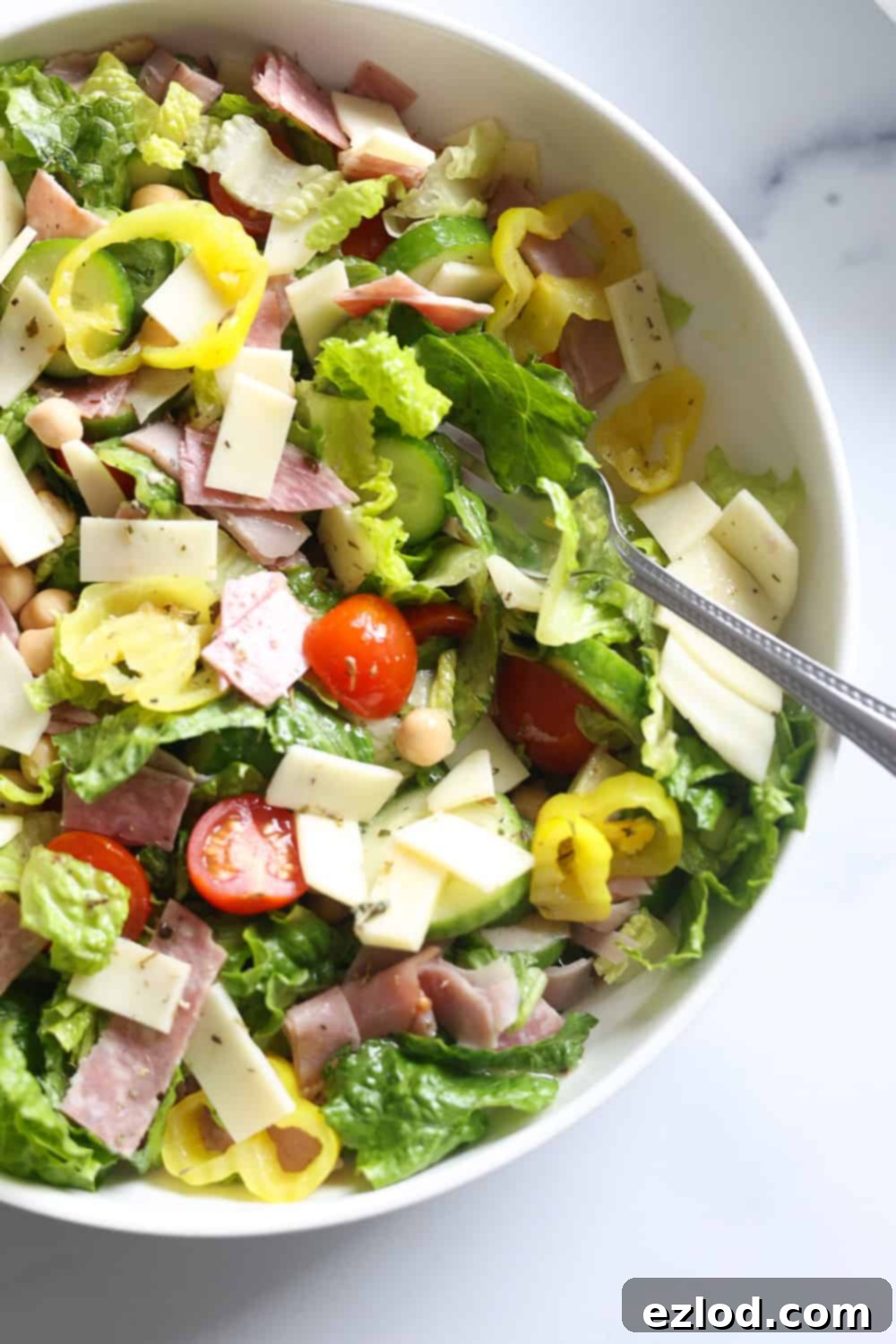 TikTok's Favorite Italian Grinder Chopped Salad 8 A generous serving of Italian Chopped Grinder Salad, ready to be enjoyed, highlighting its fresh ingredients and robust composition.