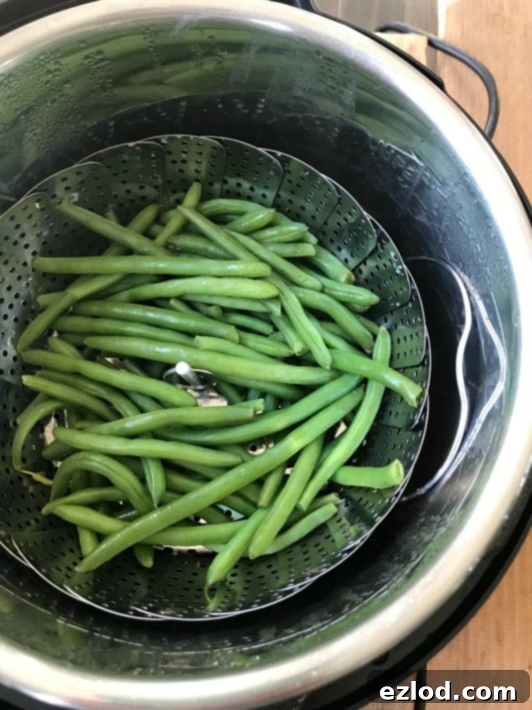 Steaming green beans in Instant Pot using chicken sauce