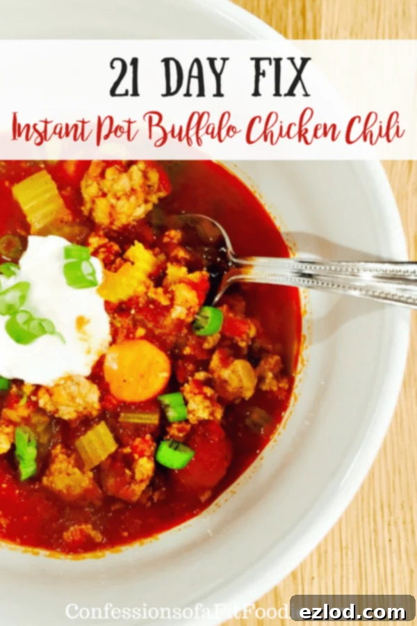 Delicious 21 Day Fix Instant Pot Buffalo Chicken Chili topped with blue cheese and chives