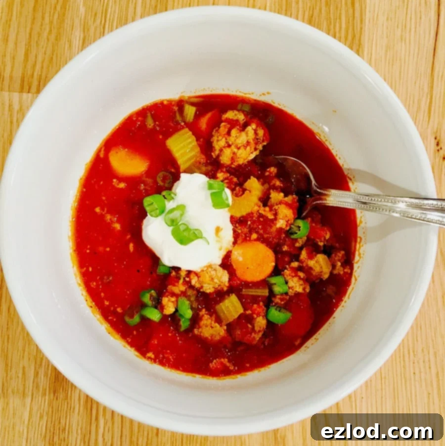 Buffalo Chicken Chili with a creamy blue cheese topping in a bowl