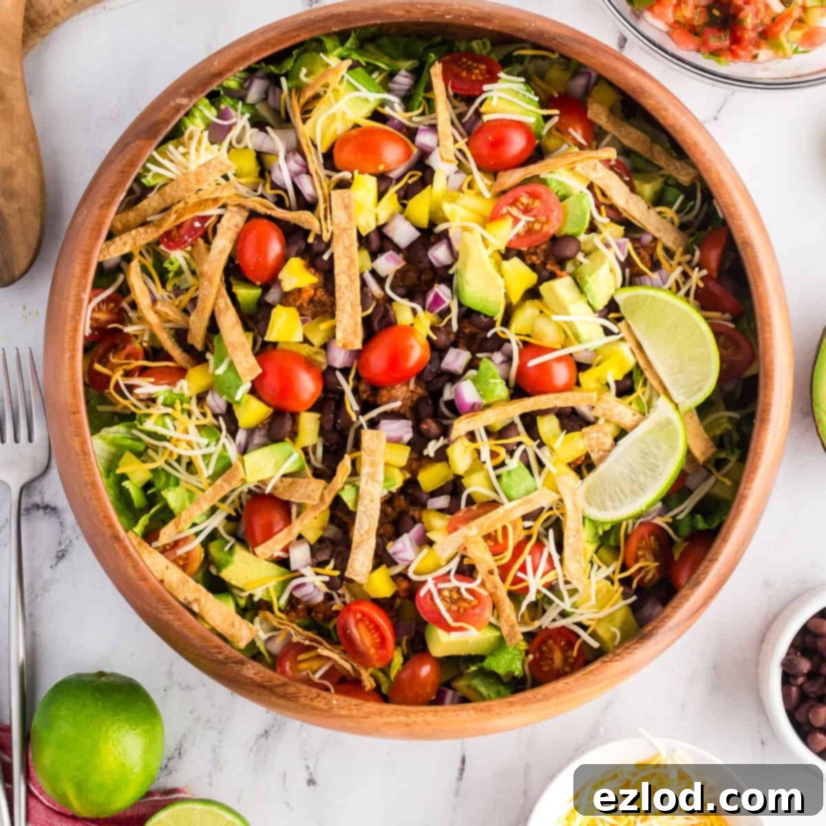 Our Favorite Simple and Healthy Taco Salad Recipe 2 A beautifully arranged healthy taco salad with vibrant ingredients.