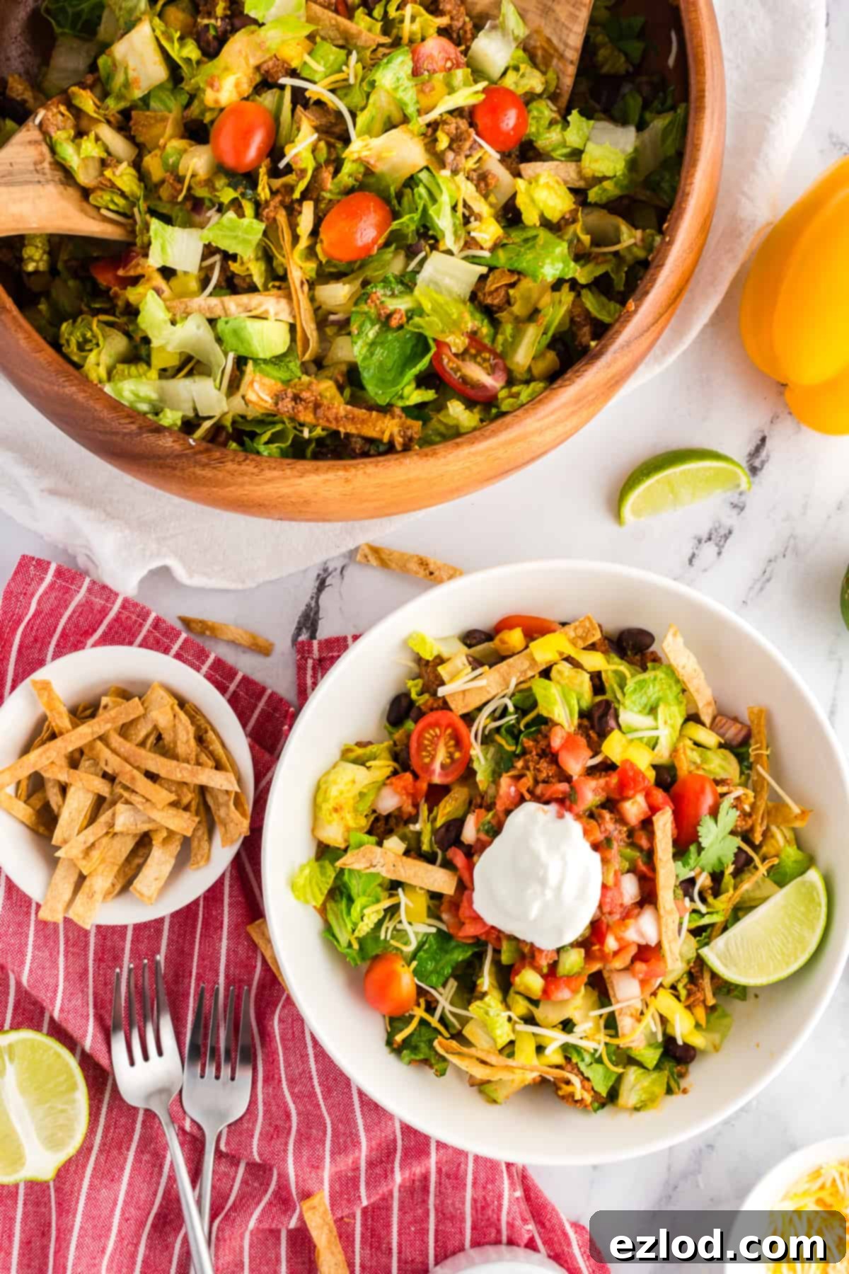 Our Favorite Simple and Healthy Taco Salad Recipe 3 Close-up of a colorful taco salad, showcasing fresh ingredients.