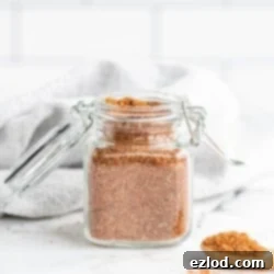 Zero Salt, Full Taco Flavor 7 A glass jar filled with homemade salt-free taco seasoning, ready for use.