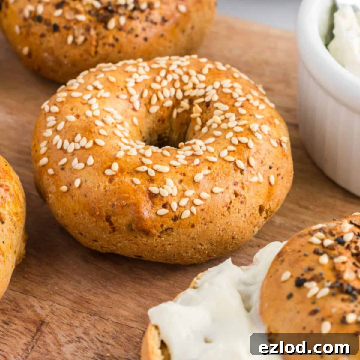 high protein bagels on a wooden cutting board