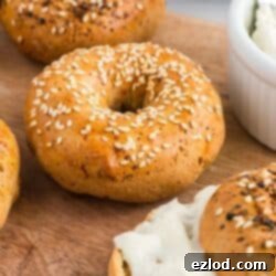 high protein bagels on a wooden cutting board
