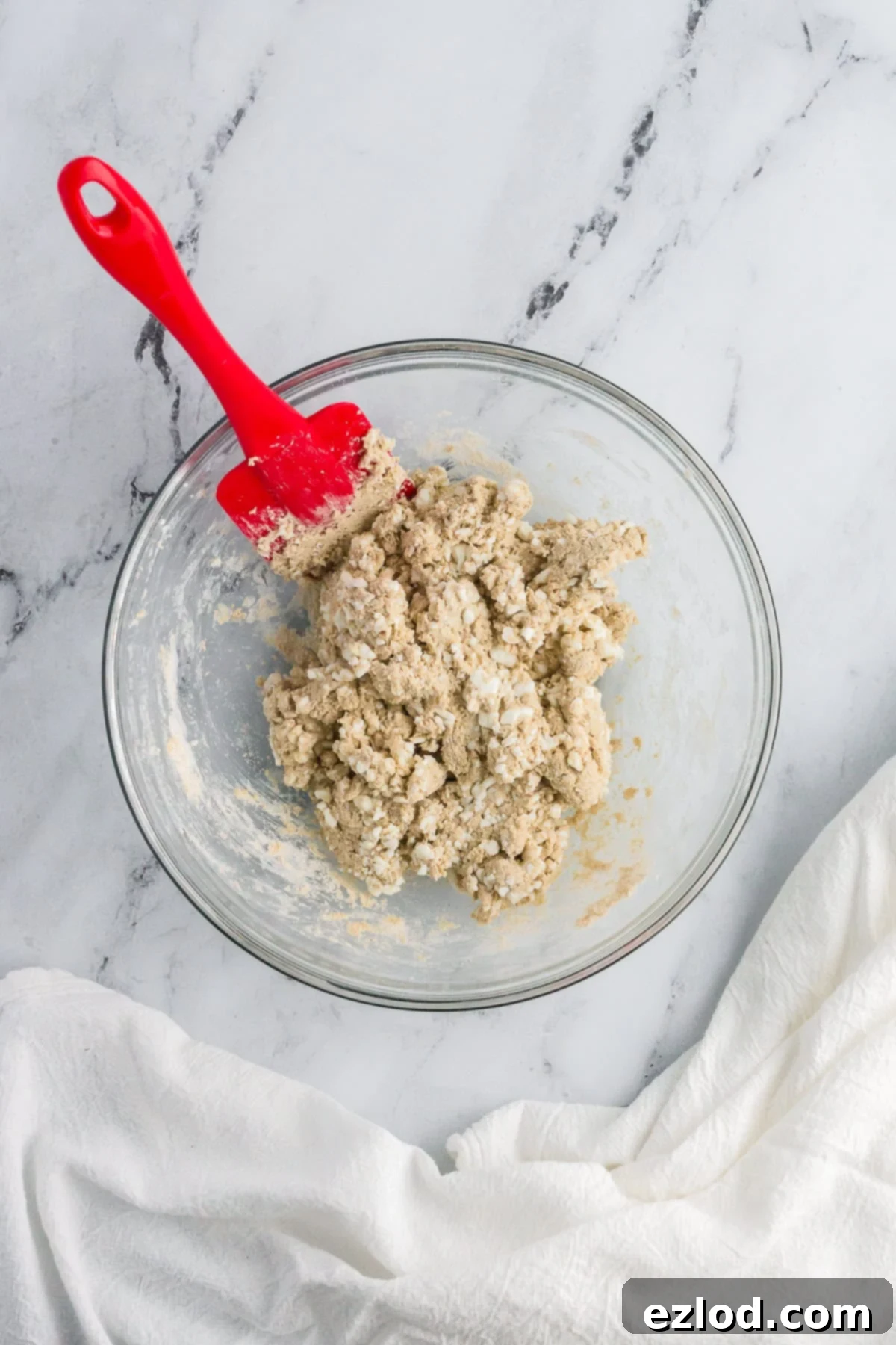 ingredients for high-protein bagels in a bowl, mixed.
