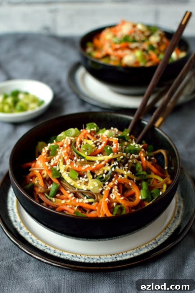 Colourful spiralized vegetable noodle bowls with spicy peanut sauce - quick, easy, healthy and delicious!