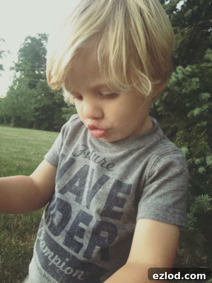 A young Max looking thoughtful, illustrating the challenging period before his Autism diagnosis.
