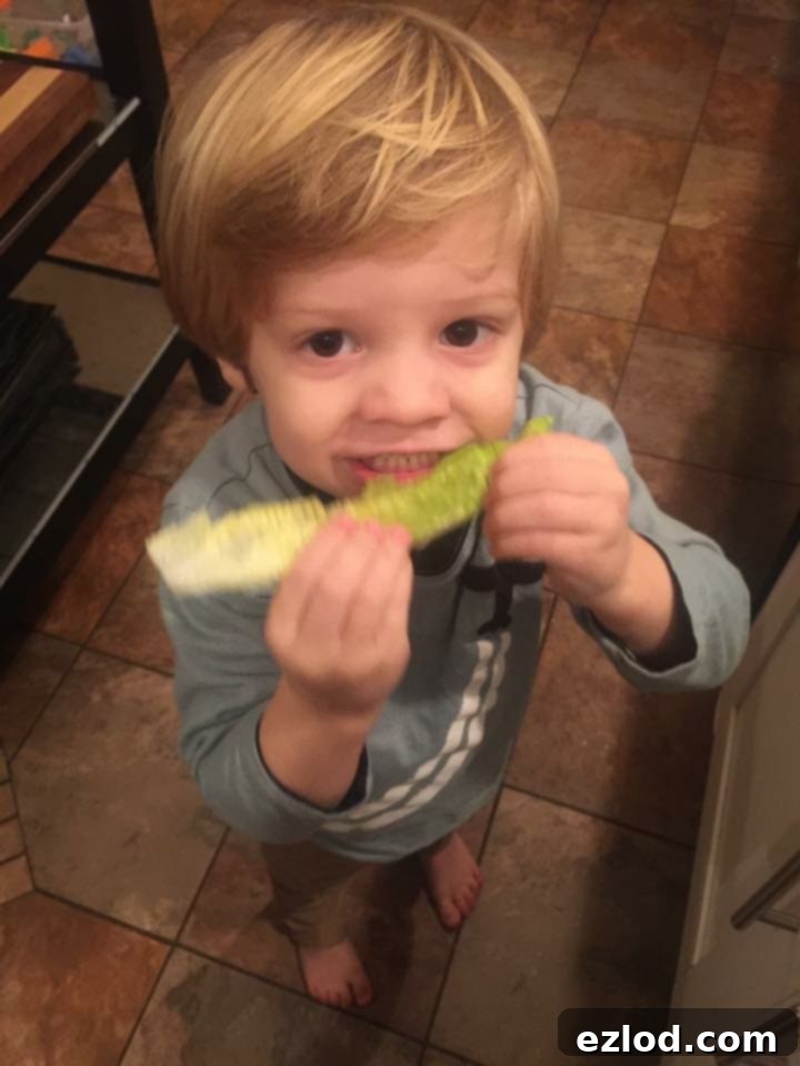 Max smiling and interacting, showcasing the progress made after a year of Autism therapy.