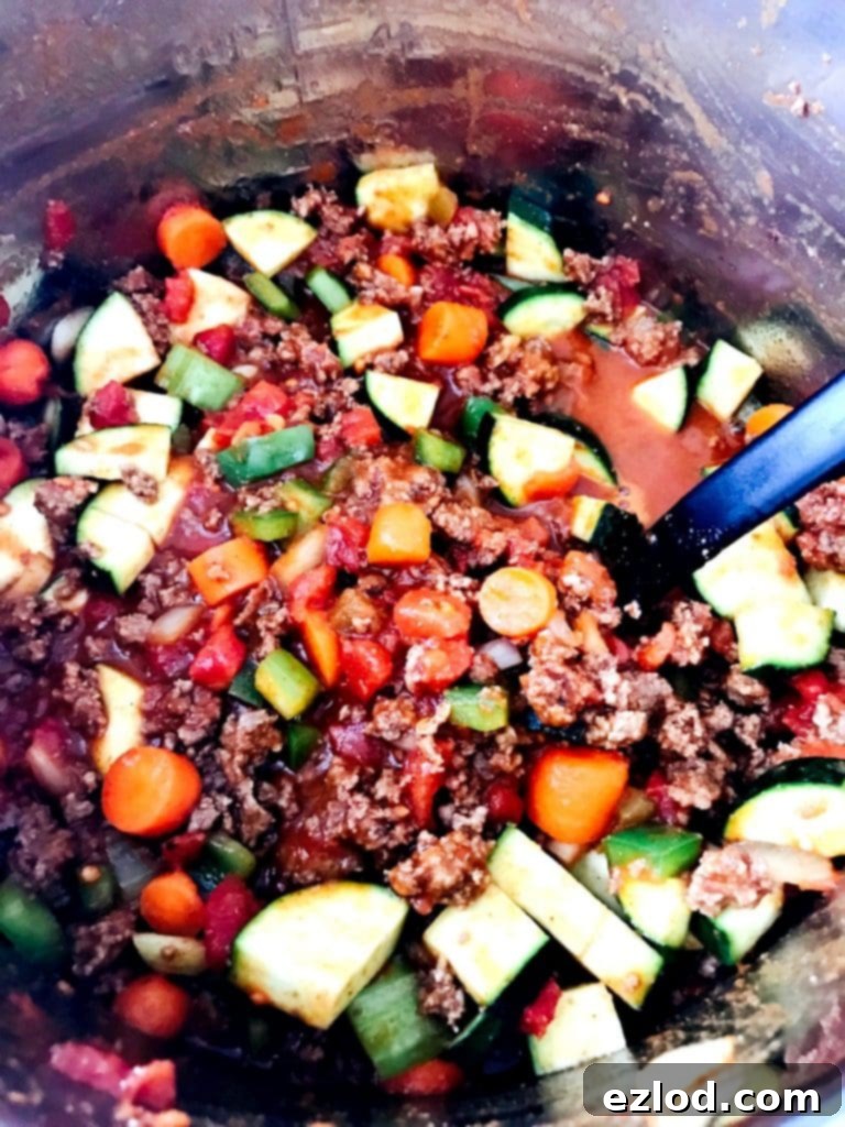 His Instant Pot Beanless Beef Chili is perfect for 21 Day Fixers and all my Whole 30/Paleo friends, too!