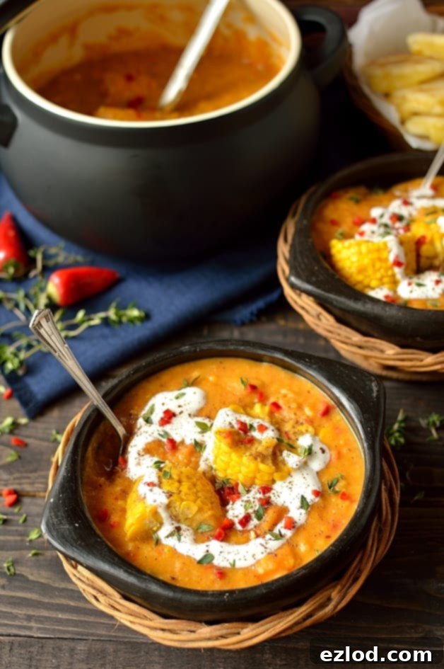 Close-up of creamy, flavorful spiced yellow split pea and sweetcorn soup, garnished and ready to serve