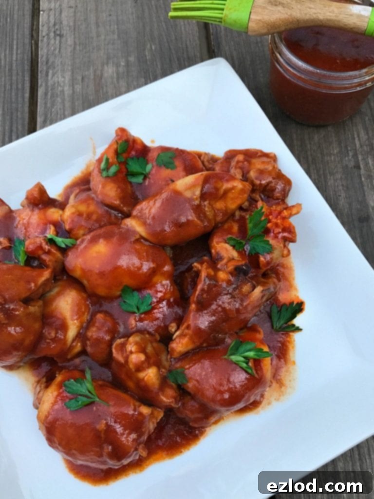21 Day Fix Instant Pot BBQ Chicken | Confessions of a Fit Foodie, served with fresh cilantro as garnish.
