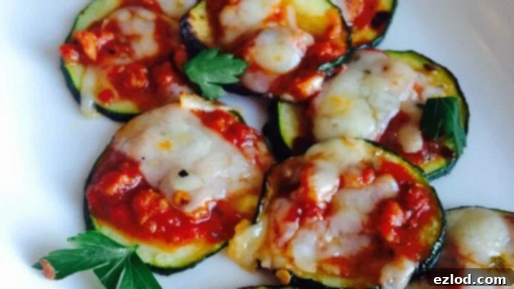 Mini zucchini pizzas with cheese and toppings