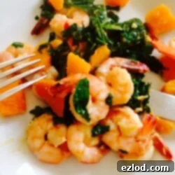 Easy Shrimp, Kale, and Butternut Squash Saute - a 21 Day Fix dinner recipe from ConfessionsOfAFitFoodie.com - cooked dish ready to serve
