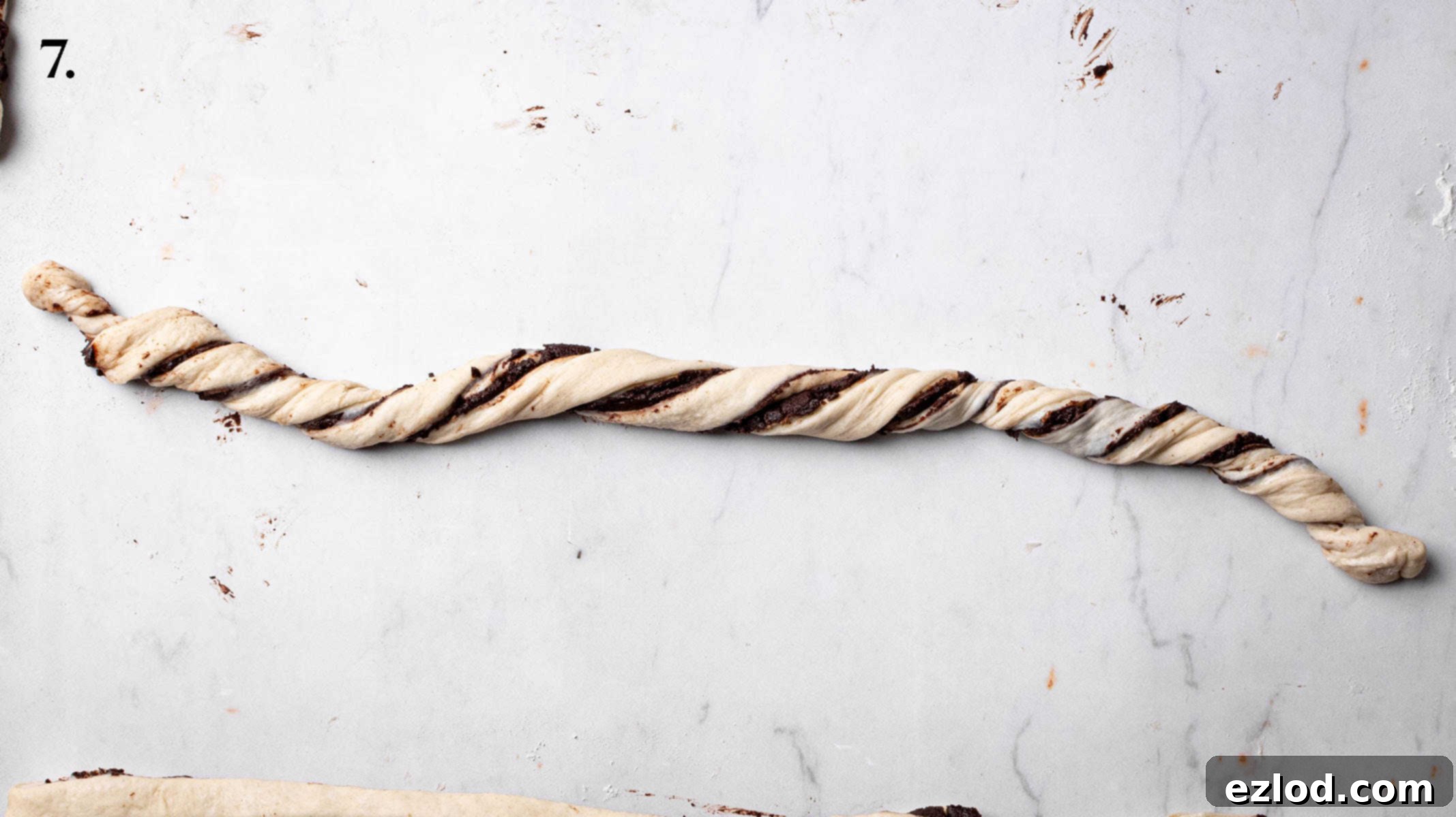 Step 7, one of the strips twisted into a spiral.
