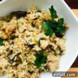 Instant Pot Brown Rice and Sausage Stuffing recipe card image, gluten-free and dairy-free.