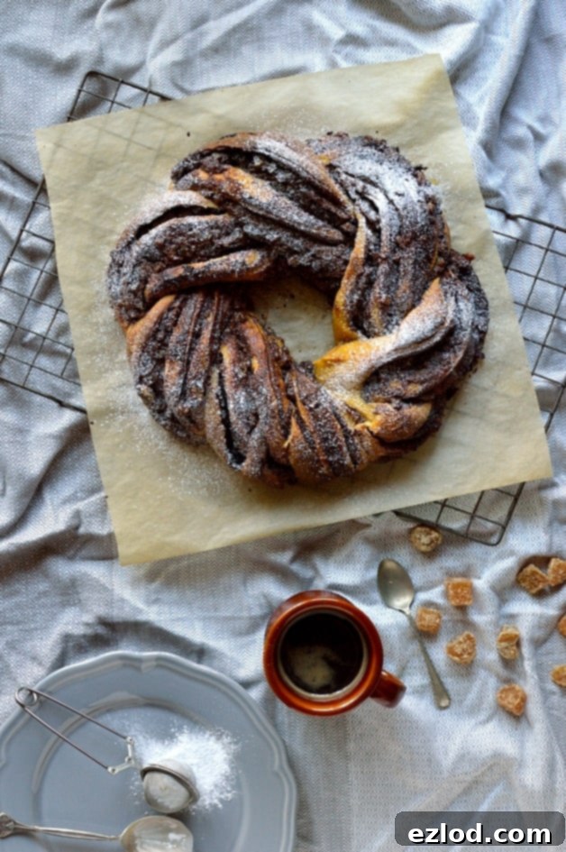 Chocolate and crystallised ginger swirled yeasted pumpkin spice bread wreath