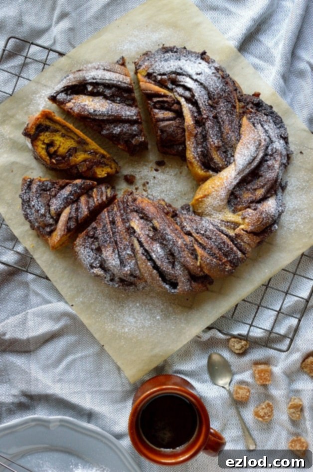 Chocolate spread and crystallised ginger filled yeasted spiced pumpkin bread twist