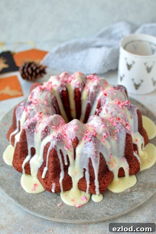 Red velvet bundt cake with white chocolate peppermint cream cheese glaze - the perfect festive cake!