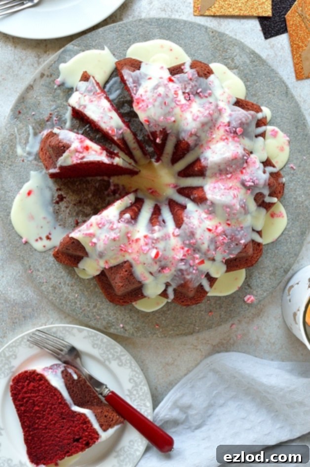 Red velvet bundt cake with white chocolate peppermint cream cheese glaze - the perfect festive cake!