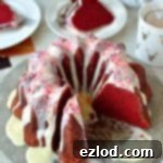Red velvet bundt cake with white chocolate peppermint cream cheese glaze - the perfect festive cake!