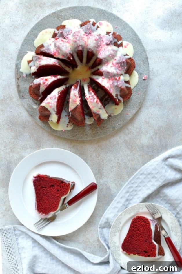Red velvet bundt cake with white chocolate peppermint cream cheese glaze - the perfect festive cake!