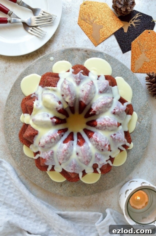 Red velvet bundt cake with white chocolate peppermint cream cheese glaze - the perfect festive cake!