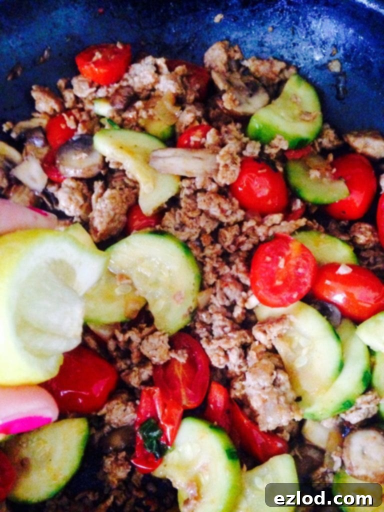 Spicy Sausage & Roasted Vegetable Medley 3 Spicy Sausage with Veggies - a 21 Day Fix approved dinner recipe from Confessions of a Fit Foodie