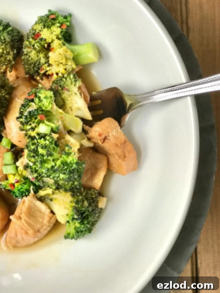 A vibrant bowl of Healthy Instant Pot Chicken and Broccoli, showcasing tender chicken, bright green broccoli, and a savory sauce.