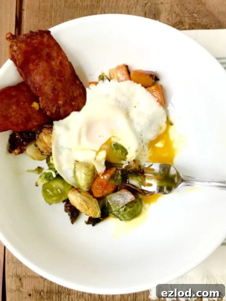 Close-up of Sheet Pan Breakfast with bacon, sweet potatoes, and Brussels sprouts