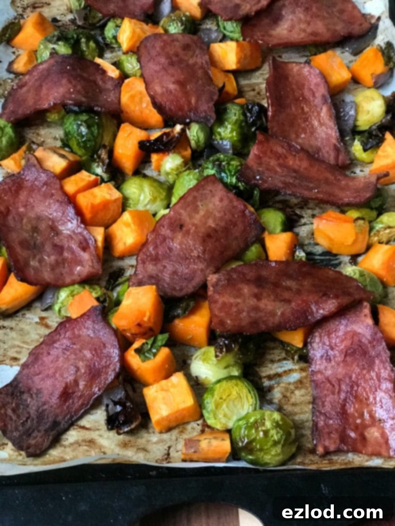 Sheet Pan Breakfast ready to serve, with an egg on top