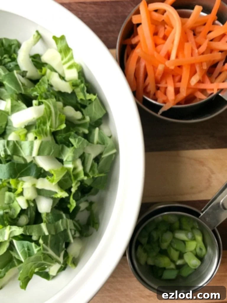 Various healthy toppings for Instant Pot Ramen Noodles, including scallions and chili paste.